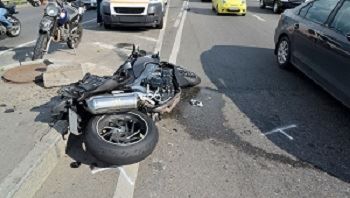 motorcycle on the street in California after serious accident with a motor vehicle